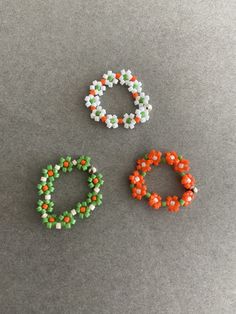 Beaded stretch Flower Ring - White, Orange, Green Color : White, Orange, Green Size : about 20mm Ring Size : one size ( fit for size 6 to 7 ) Materials : Seed bead, Acrylic bead * Metal components seed bead, acrylic bead. * Comes in a jewelry box. If you need extra boxes for gifting....just let us know! Handmade White Flower Ring For Spring, White Beaded Flower Ring For Gift, White Beaded Flower Shaped Ring, White Beaded Flower Ring As Gift, White Flower Ring Perfect For Gifts, White Adjustable Casual Rings, White Beaded Flower Ring, Casual White Adjustable Rings, Owl Ring