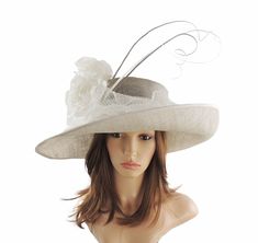 Hats By Cressida Ascot Kentucky Derby Collection Pale Grey & White Kentucky Derby Hat Pretty white chiffon tulle trimmed with while silk roses on a pale grey sinamay hat and curled quills Brim measures 43 cm side to side with a crown height of 10cm Inside circumference is 58cm. If you need this stretched please let us know when you order with your head size Due to the size this will be shipped UPS 2 day service Please be aware that all fascinators & hats are made to order and during busier times Fitted Wide Brim Sun Hat For Wedding, Summer Wedding Costume Hat With Flat Brim, Fitted Sun Hat For Spring Weddings, Spring Wedding Sun Hat, Fitted Brimmed Sun Hat For Wedding, Spring Wedding Hats With Curved Brim, Summer Wedding Hat With Short Brim, Spring Wedding Straw Hat With Curved Brim, Spring Wedding Wide Brim Boater Hat