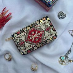 Small Boho Wallet: Handcrafted Warmth with Turkish Motifs - A Thoughtful Gift Choice** Carry a captivating story in our small boho wallet, meticulously handcrafted to blend Turkish motifs with modern design. Relive the texture of the past in an accessory that's more than just a wallet; it's a carrier of historical sentiment. **Features - **Historical and Modern Fusion A unique blend of bohemian style and modern design, connecting Turkish motifs in an unforgettable way. - **Journey to the Past Ea Bohemian Clutch With Zipper Pouch For Daily Use, Bohemian Zipper Pouch Clutch For Daily Use, Rectangular Clutch With Zipper Closure As Gift, Rectangular Clutch With Zipper Closure For Gift, Rectangular Zipper Wallet As Gift, Rectangular Wallets With Zipper Closure As Gift, Gift Clutch Wallet With Zipper Pouch, Gift Zipper Clutch Wallet, Bohemian Coin Purse As Gift