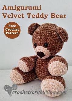 a crocheted teddy bear sitting on top of a white surface with the text, amigurmi velvet teddy bear free crochet pattern