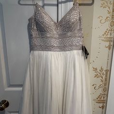 Never Worn, Tags Still On! Size 2 Adrianna Papell Sleeveless Beaded Dress. Color: Ivory White Sleeveless Dress With Beaded Straps, White Dress With Beaded Spaghetti Straps, Embellished Sleeveless Cream Dresses, Cream Embellished Sleeveless Dresses, Cream Sleeveless Sequin Dress, White Beaded Strap Dresses For Prom, Adrianna Papell Dresses, Adrianna Papell, Beaded Dress