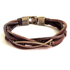 This Christian braided Leather bracelet is made of Genuine dark brown leather carefully hand braided into one unique bracelet. It manifests a true rustic charm and has a very authentic look. The bracelet is about 12mm wide. It's one of the BeGenuine's bestsellers! This bracelet will become your absolute favorite! What a great addition to your accessories! It is very comfortable & easy to wear.  Average shipping time to US/Canada 5-10 business days. BeGenuine is an European brand known for it's q Christian Fish Symbol, Bracelet Man, Fish Symbol, Faith Bracelet, Mens Bracelets, Couples Bracelet, Faith Jewelry, Jewelry Mens, Men's Bracelets