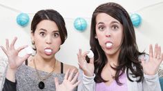 two women are making funny faces with their hands