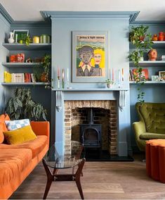 a living room filled with furniture and a fire place in front of a brick fireplace