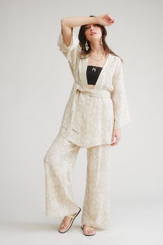 Jacquard linen blended kimono with self-beltMatching with pants Fabric contents: 60% cotton 20% rayon 20% linen Beige Linen Kimono For Loungewear, Spring Daywear Belted Kimono, Spring Belted Kimono For Daywear, Linen Kimono With Kimono Sleeves For Loungewear, Casual Linen Kimono For Loungewear, Bohemian Linen Sets For Spring, Summer Linen Kimono For Loungewear, Summer Daywear Belted Kimono, Summer Belted Kimono For Daywear