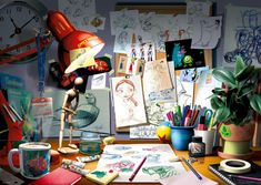 a cluttered desk with art supplies and drawings on the wall next to a lamp