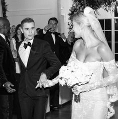 a bride and groom dance together at their wedding reception