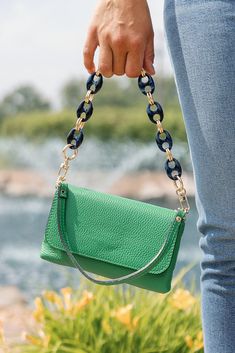 Customize your bag with a unique shoulder strap to reflect your personal style. Shoulder Strap length 17" Crossbody Strap length approx. 47" Gold finish mixed with resin links Trendy Green Bag Strap For Everyday, Trendy Green Everyday Bag Strap, Green Shoulder Bag With Chain Strap For Travel, Everyday Chain Link Bag With Detachable Strap, Blue Shoulder Bag With Chain For Everyday Use, Blue Chain Shoulder Bag For Everyday Use, Green Shoulder Bag With Chain For Everyday Use, Green Chain Shoulder Bag, Stylish, Everyday Green Shoulder Bag With Chain Strap