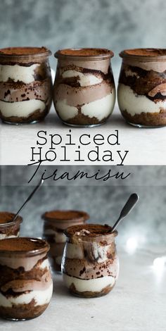 four jars filled with dessert sitting on top of a table