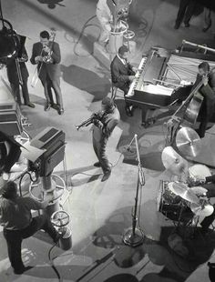 black and white photograph of band members playing instruments