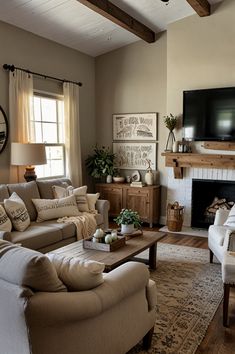 a living room filled with furniture and a flat screen tv mounted on the wall above a fire place