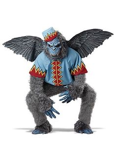 a gorilla costume with wings on it's chest and legs, sitting in front of a white background