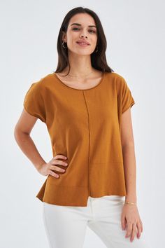 Introducing our Fine Sleeveless Asymmetric Knit Blouse, a perfect blend of comfort and style. Crafted from 100% pure cotton, this top is designed with your comfort in mind, allowing your skin to breathe freely in warm weather. Our unique asymmetric design adds a modern twist to the classic blouse, setting you apart from the crowd. The sleeveless design lets you soak up the sun on hot days and provides the perfect opportunity to layer on chillier ones. This blouse isn't just about comfort and sty Versatile Brown Cotton Tops, Chic Brown Fine Knit Tops, Brown Relaxed Fit Knit Tops, Casual Asymmetrical Knit Top, Brown Asymmetrical Summer Top, Classic Blouses, Soft Textiles, Asymmetrical Design, Hot Days