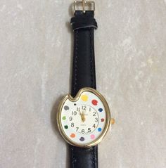 Finesse women's artist watch, having a colorful paint palette white dial, displaying black arabic numbered hours, all on a black leather band. this is an unused still new watch, in perfect working condition. this item will arive beautifully in a velvet watch pouch and would make an awesome gift item. measurements: bezel/case 1 3/8" x 1 1/4", dial 3/4" in diameter, band width 5/8"and fits a standard 6" up to a 7.5" wrist, perfectly! we ship fast, the next business day for a quick delivery to you! may you have a wonderful time shopping, best wishes! Colorful Watches, Paint Palette, Women's Watch, White Dial, Quick Delivery, Leather Band, Wonderful Time, Gift Item, Womens Watches