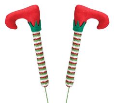 Plush and felt red, white, and green striped elf pant leg picks. Picks have green and red zig zag elf boot cuffs. Legs are bendable for placement. Pick is made from metallic green wire.15.5" Tall. 9"H x 1"W x 4"D15"5 Tall. 15.5"H x 3.5"W x .5"D *Due to weight + bulk, please note that additional shipping charges may apply. A separate invoice will be sent for those. Elf Boots, Elf Legs, Boot Cuffs, Green And Red, Green Stripes, Zig Zag, Elf, Red White, Christmas Decorations