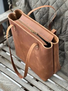 "CUSTOMIZABLE LARGE Genuine Leather Tote Bag *LIFETIME WARRANTY* STANDARD options: *Large size! ~13H\" x ~15W\" x ~6.25\" open top * NEW! ZIPPERED TOP *Rolled Top  *10\" drop shoulder strap *1 interior pocket (doubles as 2) DELUXE options: * NEW ZIPPER TOP!! *2 inner pockets (1 zippered, 1 open) *Feet (5 of the hardware color you choose) *Keychain Strap w/ fob *Choose shoulder strap leather Handmade in Potter Co. PA in my little sew shop ~B." Classic Shoulder Bag With Interior Card Slots As Gift, Classic Handmade Bag For Daily Use, Classic Handmade Bags For Daily Use, Modern Bag With Zipper Pocket For Gift, Modern Bag With Zipper Pocket As Gift, Classic Tote Shoulder Bag As Gift, Classic Handmade Bags For Everyday Use, Gift Tote Bag With Zipper Pocket, Briefcase Tote As Gift