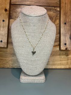 The Brownie was found in the Manatee River which leads directly into the Gulf of Mexico! Brown shark teeth have been more challenging to find. This is a 16" white beaded gold chain. Pearl Beaded Necklace With Adjustable Chain As Gift, White Beaded Chain Necklace For Gift, White Beaded Necklaces With Heart Pendant, Dainty Beaded Pearl Necklace For Gift, Gold Crystal Necklaces With Delicate Chain And Round Beads, Gold Necklace With Heart And Round Beads, Dainty Beaded Pearl Necklace As Gift, Dainty Beaded Chain Pearl Necklace Gift, Gold Necklaces With Round Heart Beads