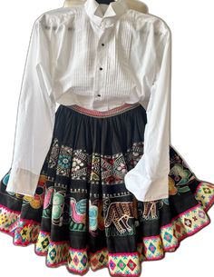 Fitted Embroidered Skirt For Fall, Fitted Embroidered Fall Skirt, Embroidered Fitted Skirt For Fall, Traditional Fitted Embroidered Skirt, Traditional Fitted Skirt For Spring, Traditional Embroidered Fitted Skirt, Traditional Fitted Mini Skirt, Bohemian Fitted Skirt With Multicolor Embroidery, Traditional Embroidered Mini Skirt