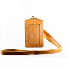 This ID Card Holder is made of premium genuine cowhide leather  which is very soft , This ID card has a very attractive and elegant design. Color : Brown Material : Cow leather (pull up) DIMENSIONS : 11 cm x 7 cm  Strap with : 1,2 cm rope length : 74 cm SLOT : 2 Leather Card Holder With Id Window For Daily Use, Leather Wallets With Key Leash For Daily Use, Leather Wallet With Key Leash For Daily Use, Leather Card Holder With Id Window For Gift, Leather Card Holder With Id Window As A Gift, Rectangular Leather Patch Card Holder For Daily Use, Rectangular Leather Patch Card Holder, Card Holder Lanyard, Leather Pulls