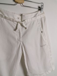 Beautiful Reebok summer bermuda shorts, very light see-through cotton, perfect for the warm season. Perfect condition, flawless! Would fit size S. Size tag reads S/ UK 10/FR S-38/Ger 36/IT S-40/Asia S. Please read the measurements below carefully and compare to one of your own garments, to avoid any disappointment regarding the fit. Measurements of the item, laying flat: - waist: 41 cm; - front rise: 24 cm; - length outseam (waist to cuff): 51 cm. Model wears size 8-10 UK, S-M European, is 160 c Summer Capris With Built-in Shorts, White Bermuda Pants For Summer, Summer Bermuda Cotton Pants, Summer Cotton Bermuda Pants, Summer Cotton Short Pants, Summer Short Cotton Pants, Summer Cotton Capris, Summer Short Cotton Capris, Short Summer Cotton Capris