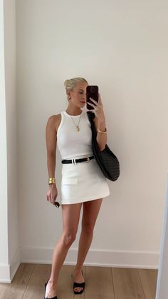 Who doesn't love a summer staple outfit? I'm wearing this simple all white outfit on repeat this summer! If you want a white mini skirt outfit with a bit of denim, this is the perfect casual summer look! I'm always putting together casual and stylish outfits. If you need old money outfit ideas, modest summer outfit ideas, cute rainy day outfit inspo, summer office outfits, and much, much more, tap to shop this look and explore my LTK for more style inspiration! White Mini Skirt Outfit, Classic Summer Outfits, Kathleen Post, Outfit Ideas Cute, Old Money Outfit