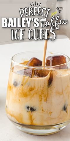 an ice cube being poured into a glass bowl with the text perfect bailey's and coffee ice cubes