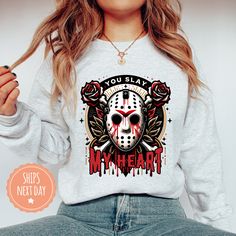 If you're looking for a thoughtful and practical gift, our apparel is sure to be appreciated by anyone who receives it. These horror valentine sweatshirts are handmade to order on an ultra-soft crewneck that will quickly become your go-to apparel item! Our trendy valentines day hoodies are made with eco-friendly water-based ink that feels good and lasts longer! You will never want to take it off! ♥Sizing info♥ *Unisex sizing. *Order your true size for a more fitted feel. Size up for a slouchier look ♥Care Instructions♥ *Wash on cold *Hang dry or tumble dry on low heat *Non-chlorine bleach only *Do not iron directly on the design ♥Shipping♥ 🚚Every order (no matter how large) ships same or next business day! We want you to receive your garment as quickly as you can so you can start enjoying Graphic Print Long Sleeve Hoodie For Gift, Graphic Print Long Sleeve Hoodie As A Gift, Scary Valentine, Gothic Valentine, Heart Sweatshirt, Movie Lover, Valentine Gift, Practical Gifts, Horror Movie