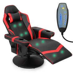 a black and red reclining chair sitting next to a remote control unit on a white background