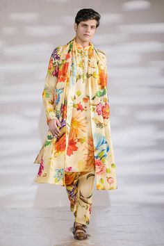 Yellow cotton silk kurta with all-over multi colored hand-painted flora and fauna printed motifs. Comes with coordinating printed pyjama pant and a stole.
Components: 3
Pattern: Hand Painted Digital Prints
Type Of Work: Flora and Fauna
Neckline: Mandarin
Sleeve Type: Full
Fabric: Cotton Silk
Color: Yellow
Other Details: 
Length:
Kurta: 42 inches
Pyjama: 38 inches
Model height: 6ft 1inch, wearing size L
Closure: Kurta: Front loop buttons
Note: The print placement may vary.
Occasion: Mehendi and P Stole For Men, Silk Kurta, Textile Pattern Design, Kurta Pajama, Textile Pattern, Pajama Pant, Digital Print Fabric, Print Placement, Kurta Designs