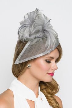 "\"Victoria\" Gray Twist Fascinator Stunning from every angle. This mesh twist fascinator has a look that's both daring and elegant. This statement-making fascinator headband rises to the occasion with a twist mesh base, fluffy bouquet of flighty feathers all on an easy to wear headband with precision placement. This is a modern twist on the loved fascinator. - Light weight - Attached to headband for easy wear - Comes in several other bold colors Shop the skirt and top at www.pippaandpearl.com" Fluffy Bouquet, Grey Fascinator, Derby Attire, Kentucky Derby Style, Edgy Dress, Derby Outfits, Hat Headband, Fascinator Hairstyles, Fascinator Headband