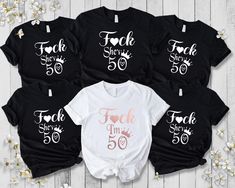 six personalized shirts with the names of five children's names and numbers on them