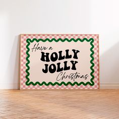 there is a sign that says have a holly jolly christmas on the front and side