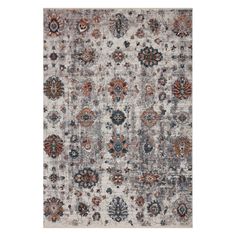 an area rug with many different colors and patterns on it, including grays, oranges