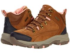 SKECHERS Trego - Alpine Trail - Women's Shoes : Brown : The SKECHERS Trego - Alpine Trail boot will update your trail-ready look with a waterproof finish, ankle height, and optimal comfort features. Waterproof, smooth suede upper features mesh panels and synthetic overlays. Lace-up design for a secure fit. Rounded toe with rubber reinforcement. Seam-sealed waterproof construction. Relaxed fit design provides a roomier fit. Rear pull-tab offers easy entry. Padded tongue and collar. Signature logo Sporty Hiking Boots For Fall Outdoor Activities, Sporty Waterproof Boots For Fall Walking, Functional Hiking Boots For Fall Outdoor Activities, Sporty Waterproof Ankle Boots For Outdoor, Sporty Waterproof Boots For Outdoor Work In Fall, Sporty Boots For Fall Outdoor Activities, Functional Waterproof Boots For Fall Outdoor Activities, Sporty Waterproof Boots With Reinforced Toe For Fall, Sporty Waterproof Boots For Fall Outdoor Activities