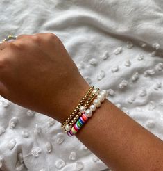 Made with freshwater pearls and 14K gold plated beads. Gold Pearl Beaded Bracelets With Letter Beads, Trendy Gold Pearl Beaded Bracelets, Gold Pearl Beaded Bracelets With Colorful Beads, Gold Pearl Bracelets With Colorful Beads, Gold Pearl Bracelet With Colorful Beads, Bracelet Rainbow, Rainbow Pearl, Daughter Love, Initial Necklace