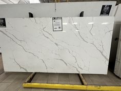 a large white marble slab in a warehouse