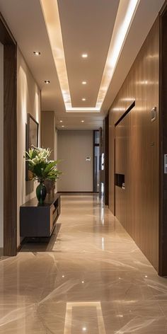 the hallway is clean and ready for us to use as an entrance way in this modern home