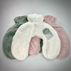 Shaped like a travel pillow this traditional hot water bottle provides warmth around the neck and shoulders, great for chasing away the chill or to soothe aches. Fur Hot Water Bottle, Hot Water Bottle, Hot Water, Travel Pillow, Faux Fur, Water Bottle, Water, Travel