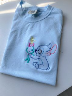 Stitch and Scrump Disney Embroidered T-shirt Disney - Etsy Stitch Shirts, Stitch And Scrump, Stitch Tshirt, Disney Etsy, Disney Inspired Outfits, Embroidered Crewneck, Funny Mom Shirts, Shirt Embroidery, Disney Shirts