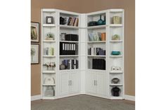 an open bookcase with many books on it