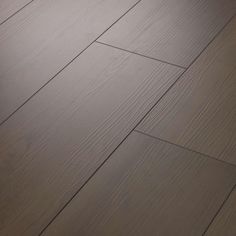 an image of wood flooring that looks like it has been painted in dark brown