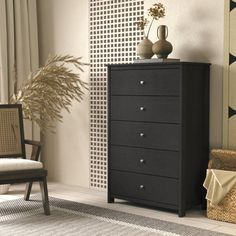 a black chest of drawers in a living room