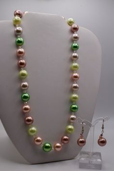 Multi-color 8mm-10mm sterling silver pearl necklace and earring set. Multicolor Pearl Drop Necklaces With Round Beads, Multicolor Round Beads Necklace With Pearl Drop, Green Round Pearl Drop Jewelry, Multicolor Single Strand Round Jewelry, Green Pearl Jewelry For Gifts, Green Pearl Round Beads Jewelry, Pink Single Strand Round Jewelry, Pink Round Single Strand Jewelry, Green Round Pearl Necklace For Gift