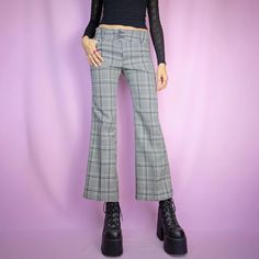 The Vintage 90s Plaid Flare Trousers are black and white checkered pattern pants with pockets, and a front zipper closure. Preppy office 1990s gingham knit tailored pants. SIZE XS MEASUREMENTS Waist 74cm - 29.13 inch Hips 88cm - 34.64 inch Inseam 72cm - 28.35 inch Our model is 172 cm tall and usually wears size XS. We ship worldwide from Spain and offer free shipping on all orders when you buy 3 items or more! ♥ https://adultworldshop.etsy.com ♥ WWW.ADULTWORLDSHOP.NET ♥ INSTAGRAM & TIKTOK @adult Preppy Office, Flare Trousers, Vintage Plaid, Tailored Pants, Pants Pattern, Checkered Pattern, Flare Pants, Trousers Women, Gingham