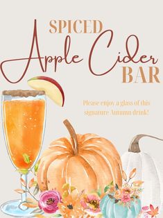 an apple cider bar is shown with flowers and pumpkins