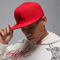 Jumpman matches with a Jumpman, so the Jordan Pro Cap Jumpman Snapback will look perfect with the rest of your gear. Because it has minimal color differentiation, it'll match perfectly with a number of outfits, even non-Jordan ones. The strapback closure allows you to find the right size easily. Features large, embroidered Jumpman logo centered on the front. Snapback (adjustable). Slightly curved bill. Utilizes Dri-FIT® technology for sweat control. Jordan Ones, White Kicks, Jumpman Logo, Soccer Shop, Minimal Color, Shop Fans, Backpack Sport, Kids Sale, Work Boots