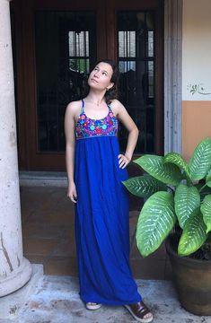 This handmade Mexican dress is perfect for any special event or for bridesmaid dresses. This traditional dress is lovingly handmade by Mexican artisans in Chiapas, Mexico. Note This dress is reduced so that you can see the measurements of the garment, the length is from the armpit We ship anywhere in the word, from Tepic, Nayarit,  mx. Made by artisans from Oaxaca, Mx We recommend washing by hand with cold water, tender in the shade, to better preserve the original color Blue Sleeveless Maxi Dress With Floral Embroidery, Bohemian Blue Maxi Dress For Wedding, Floral Embroidered Sundress Maxi Dress For Vacation, Traditional Maxi Dress With Floral Embroidery, Beach Floral Embroidered Maxi Sundress, Floral Embroidery Maxi Dress For Beach, Beach Sundress With Floral Embroidery, Embroidered Sleeveless Maxi Dress, Blue Embroidered Summer Wedding Dress