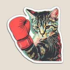 a cat with a red boxing glove sticker