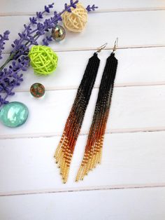 Long dangle earrings for women earrings beaded earrings seed | Etsy Summer Brown Beaded Earrings, Brown Dangle Beaded Earrings For Summer, Summer Beaded Long Drop Earrings, Elegant Beaded Tassel Earrings For Summer, Elegant Colorful Beaded Tassel Earrings For Summer, Elegant Colorful Beaded Earrings For Summer, Elegant Summer Beaded Earrings With Colorful Beads, Elegant Summer Tassel Earrings With Colorful Beads, Elegant Summer Tassel Earrings With Round Beads