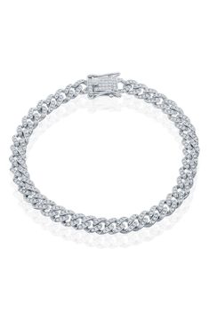 Sparkling cubic zirconia stones accent the Cuban chain of this bracelet. 7.5" length, 6.5mm width Box clasp Sterling silver, cubic zirconia Imported White Gold Diamond Bracelets With Rhinestones, Elegant Cuban Link Bracelet In Cubic Zirconia For Anniversary, Elegant Cuban Link Bracelet With Cubic Zirconia For Anniversary, Cuban Link Cubic Zirconia Diamond Bracelet For Formal, Cuban Link Bracelet In White Gold With Diamond Accents, Formal Cubic Zirconia Chain Bracelet With Pave Setting, Anniversary Chain Bracelet In Diamond White Cubic Zirconia, White Gold Diamond Bracelet With Rhinestones, Anniversary Chain Bracelet With Diamond Accents In Cubic Zirconia